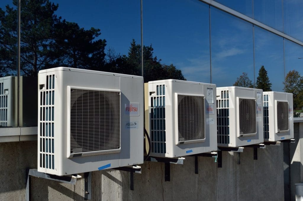 HOME PERFORMANCE TESTING: Q&A with home performance pro Corbett Lunsford 10 HVAC system on top of building - green HVAC technologies to reduce carbon emissions