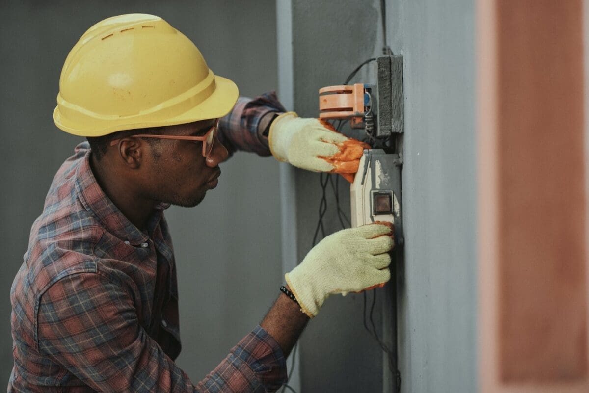 Time Management Tips for Electrical Engineers to Improve Work-Life Balance 2 electrical engineer working on panel - time management tips for electrical engineers