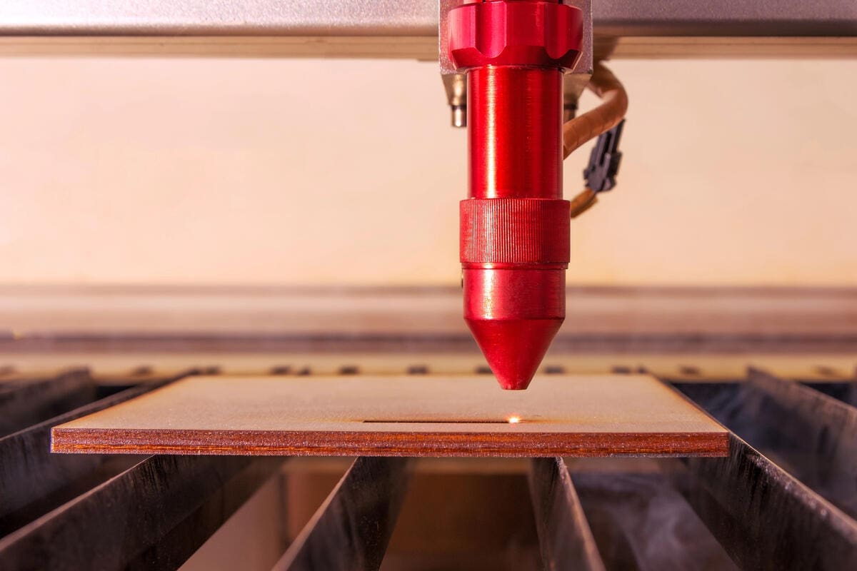 Laser Engraved Wood Project Ideas & Tools for the Task 2 laser engraver engraving a piece of wood