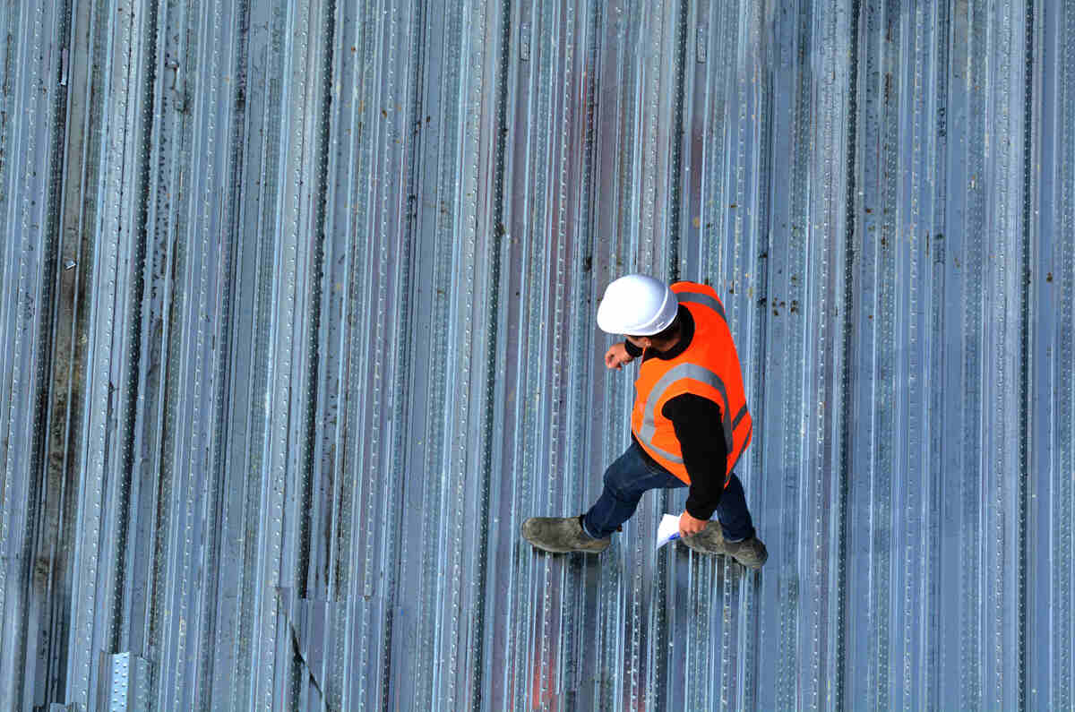 inspector walking construction site