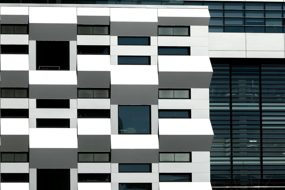 modern office building - image credit Artur Voznenko (via Unsplash)