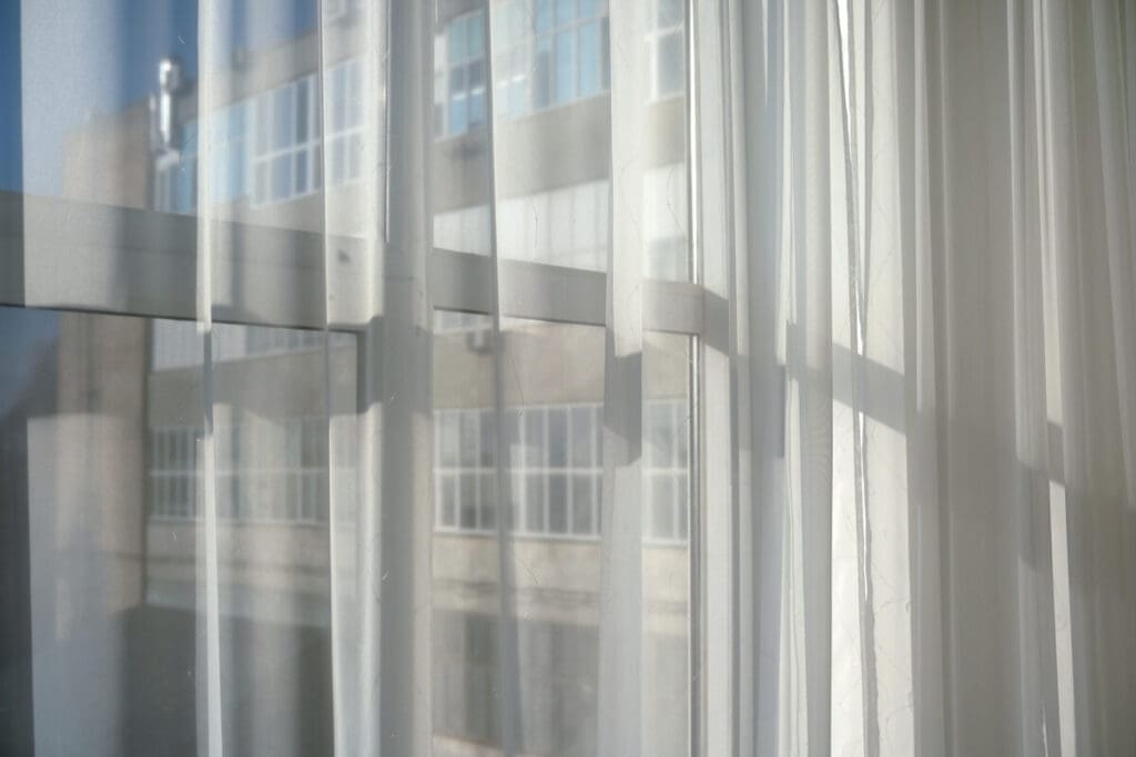5 Energy-Efficient Home Lighting Upgrades Every Homeowner Should Know 5 daylighting - window with thin drapes
