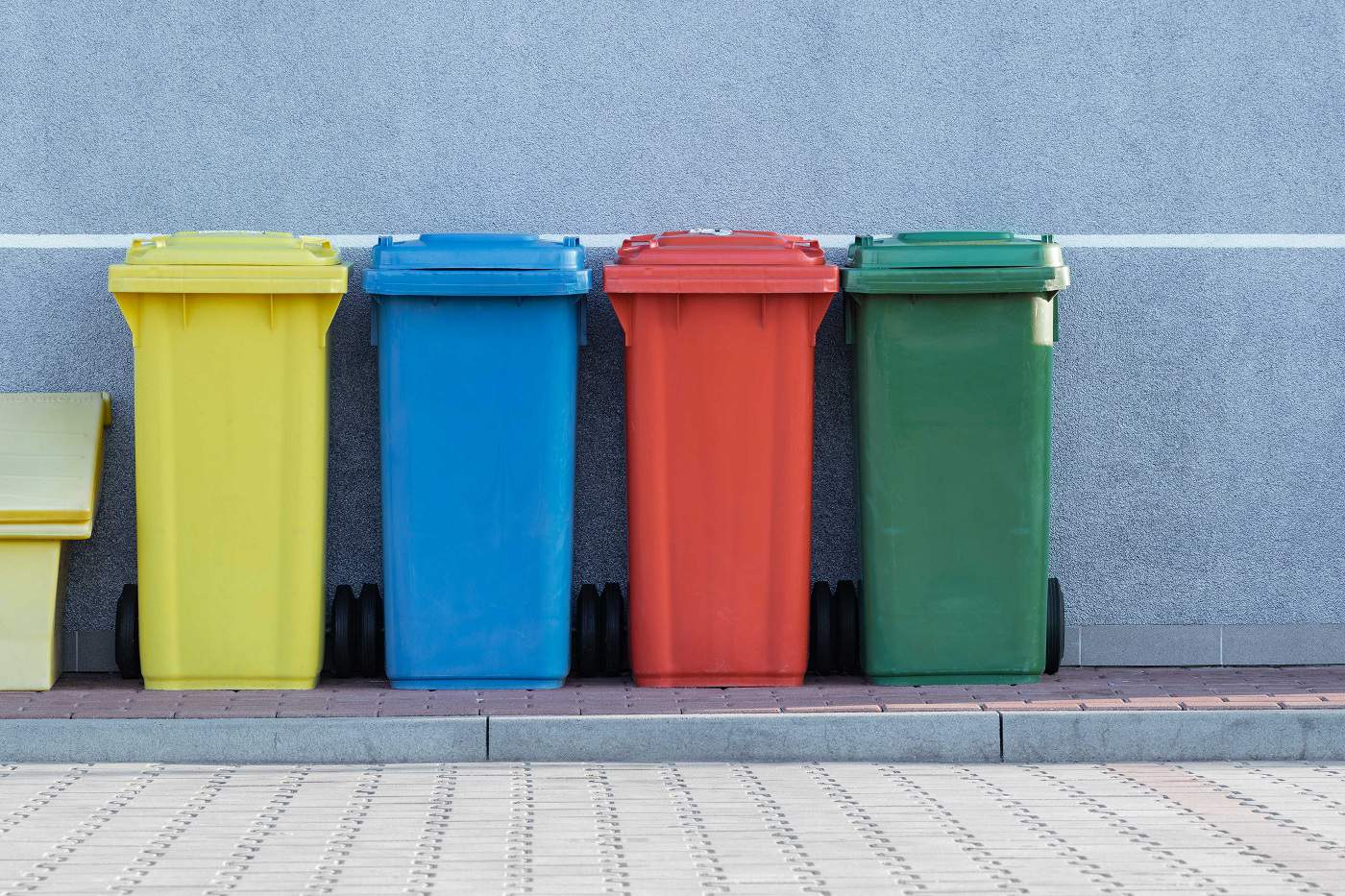 Different colored waste bins for different types of waste from Paweł Czerwiński via Unsplash