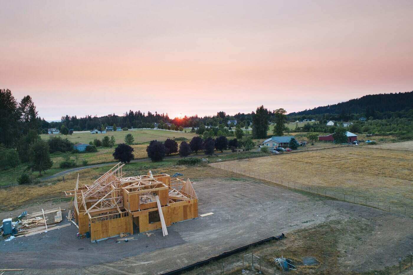 Will Measuring Carbon Use Intensity Instead of Energy Efficiency Help the Building Sector Get to Net Zero? 2 rural home under construction - will measuring carbon use intensity help the building sector get to net zero