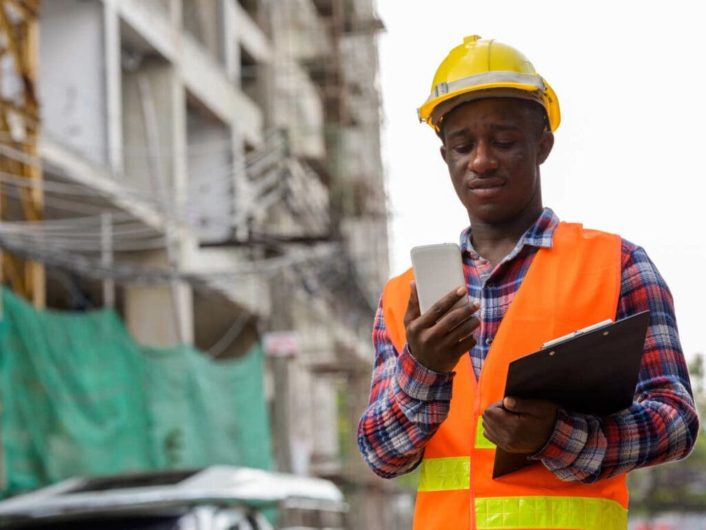 building inspector using mobile phone