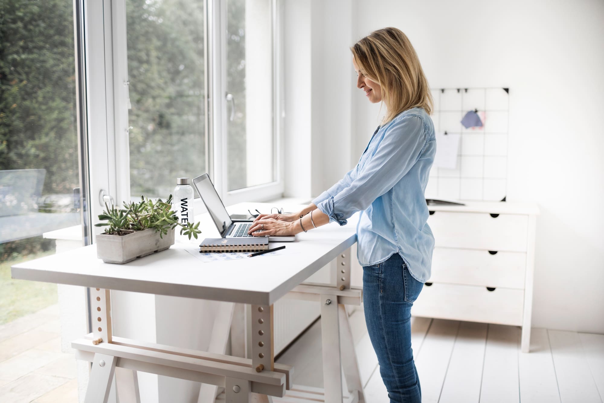 working at standing office desk